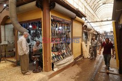 Riyadh Nimetallah continues knife sharpening profession for 35 years in Mosul
