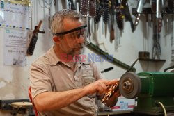 Riyadh Nimetallah continues knife sharpening profession for 35 years in Mosul