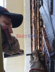 Serhiy Myronov restores the doors of old buildings in Kyiv