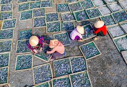 Thousands of fish are laid out to dry  - My Tan