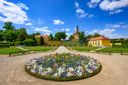 Sunny weather over the baroque monastery garden