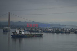 Vessels line up on the Yangtze River to cross the Gezhouba Dam